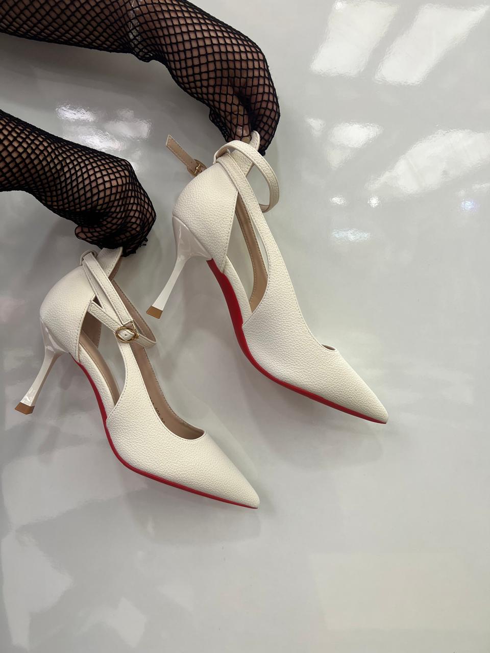 Signature-style Red outsole Ankle-strap pointed Pumps