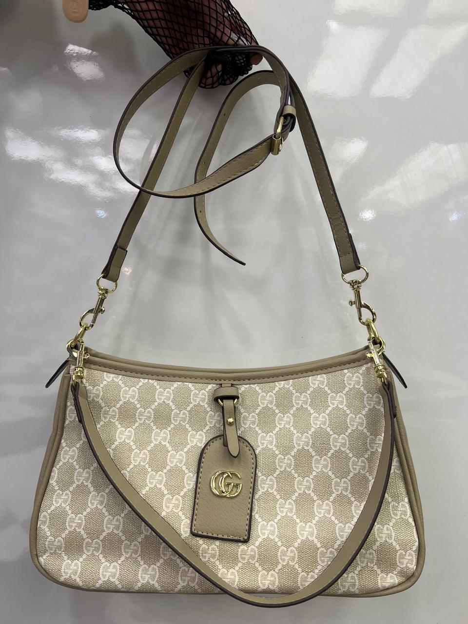 GG Embossed Leather Shoulder bag