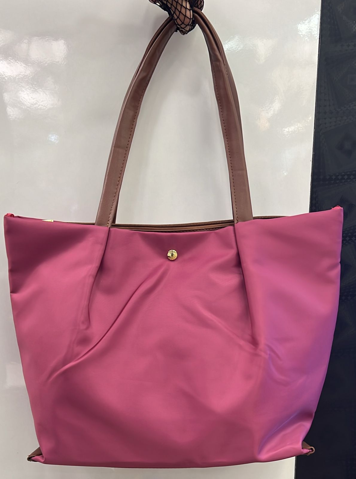Tote bag with cushioned handles for shoulder comfort