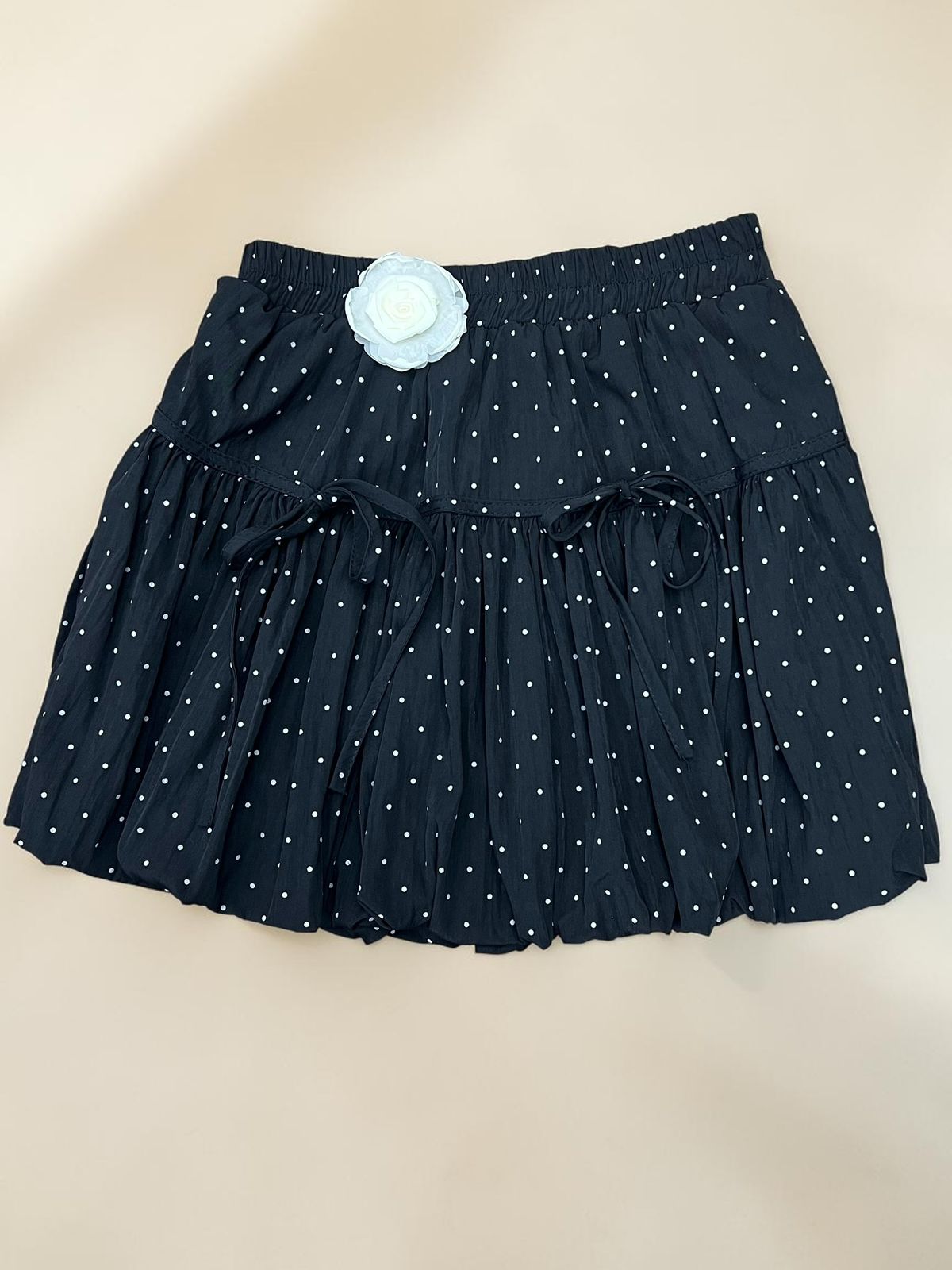 Black Polka Dot Tiered Mini Skirt with Flower Detail